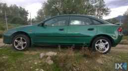 MAZDA 323F ΚΑΠΟ,ΚΟΛΩΝΕΣ,ΜΑΣΚΕΣ www.saravalaki.com